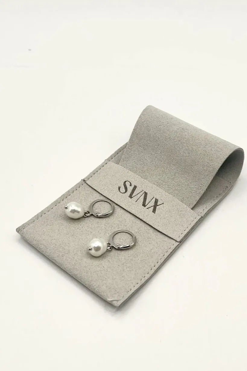 Baroque Pearl Earrings In Silver by SVNX