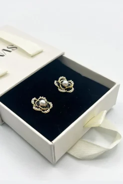 Black Flower Pearl Earrings In Gold by SVNX
