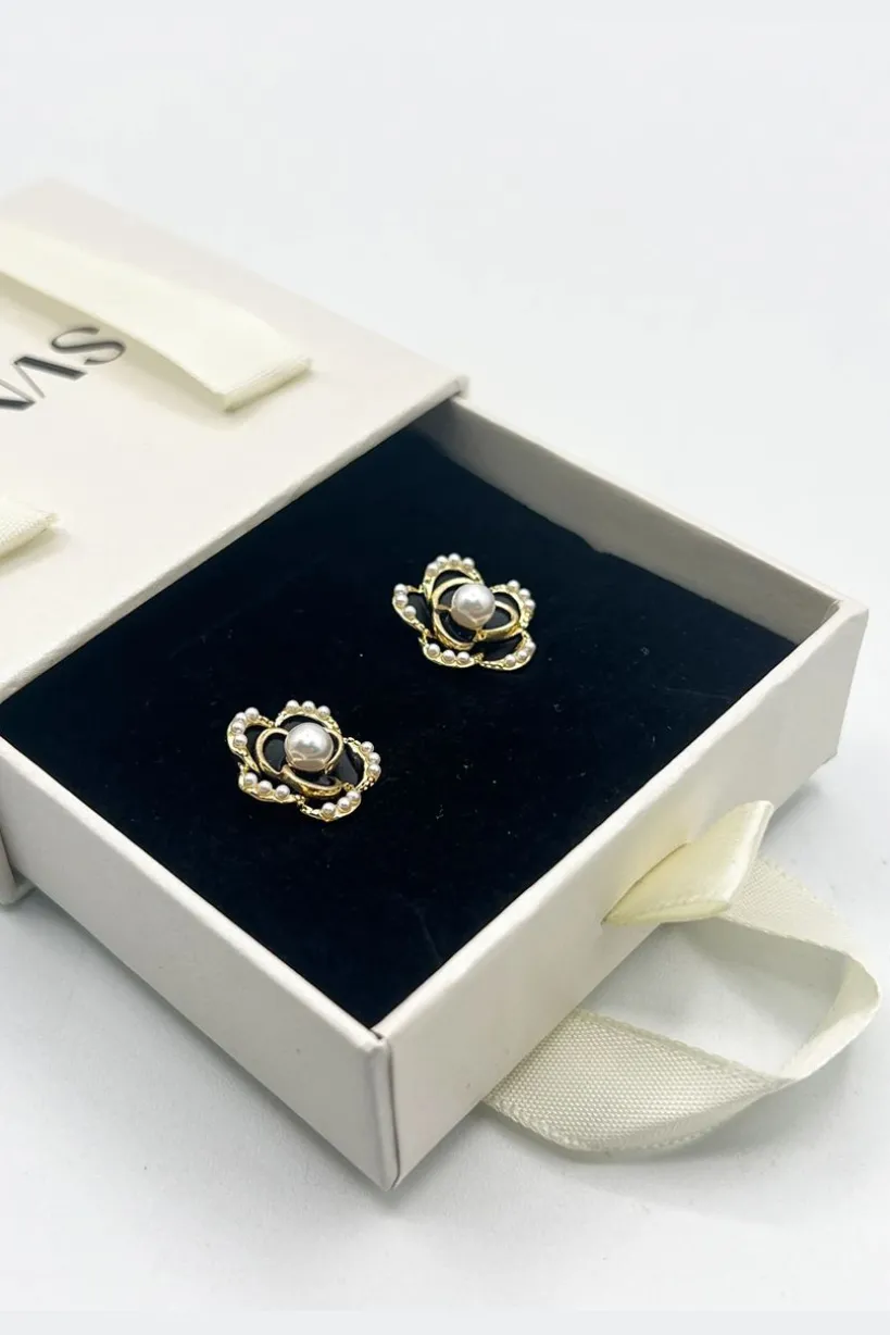 Black Flower Pearl Earrings In Gold by SVNX