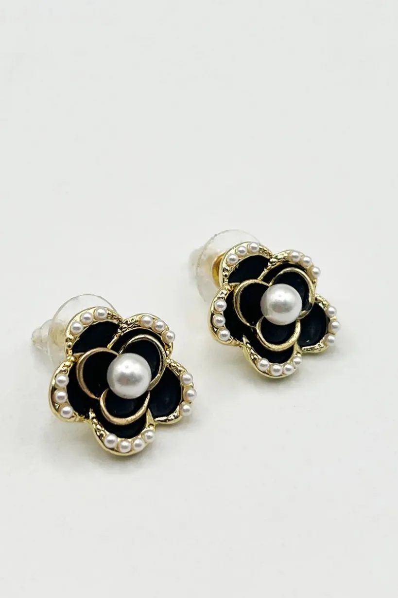 Black Flower Pearl Earrings In Gold by SVNX