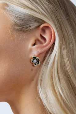 Black Flower Pearl Earrings In Gold by SVNX