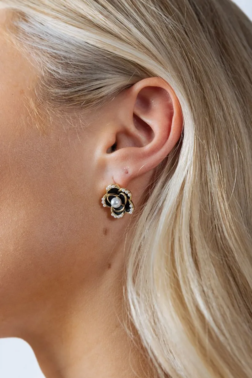 Black Flower Pearl Earrings In Gold by SVNX