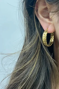 Braided Hoop Earrings In Gold by SVNX