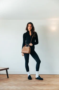 Brown Faux Leather Handbag With Gold Trim by SVNX