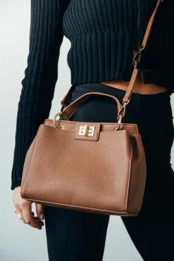 Brown Faux Leather Handbag With Gold Trim by SVNX