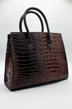 Croc Buckle Top Handle Bag In Brown by SVNX