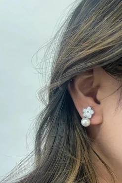 Floral Pearl Stud Earrings In Silver by SVNX