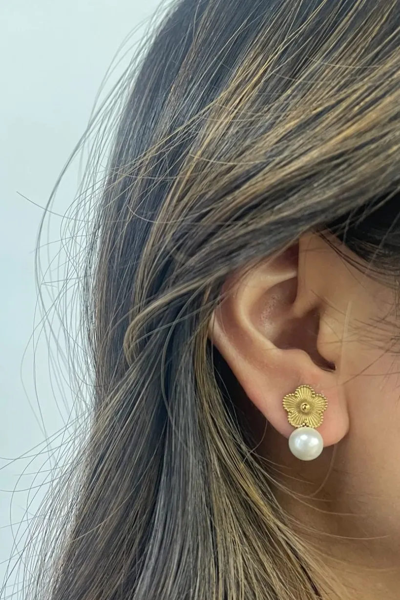 Floral Pearl Stud Earrings In Gold by SVNX