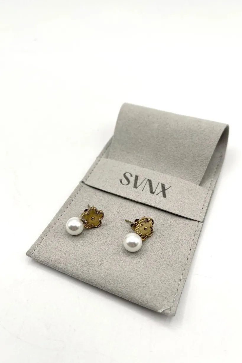 Floral Pearl Stud Earrings In Gold by SVNX