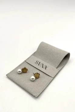 Floral Pearl Stud Earrings In Gold by SVNX