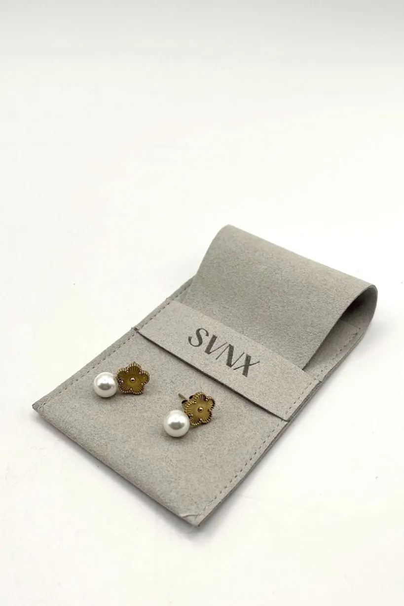 Floral Pearl Stud Earrings In Gold by SVNX