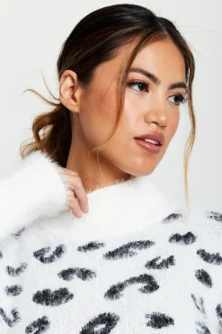 Fluffy Animal High Neck Jumper In Black And White by Liquorish