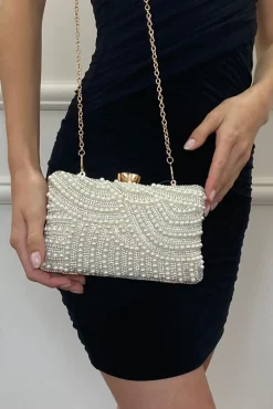 Luxurious Gold Pearl Embellished Clutch Bag by SVNX