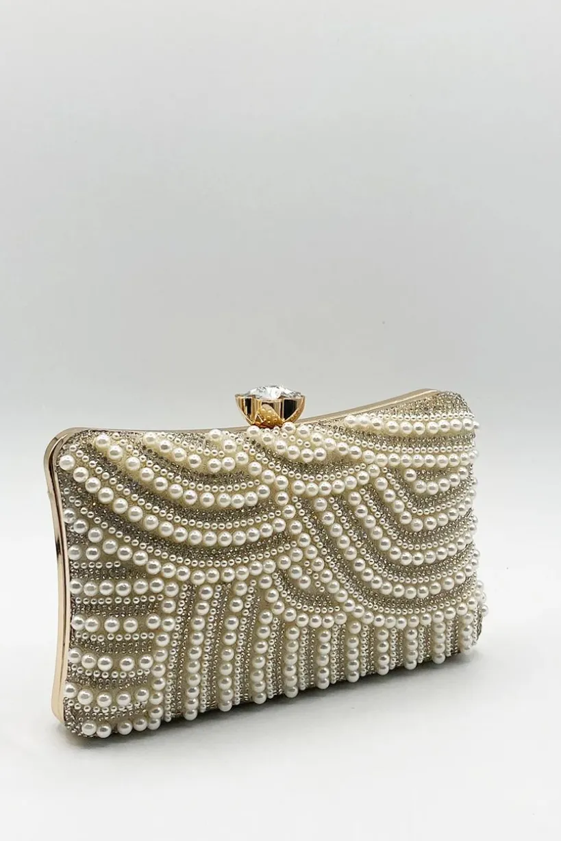 Luxurious Gold Pearl Embellished Clutch Bag by SVNX