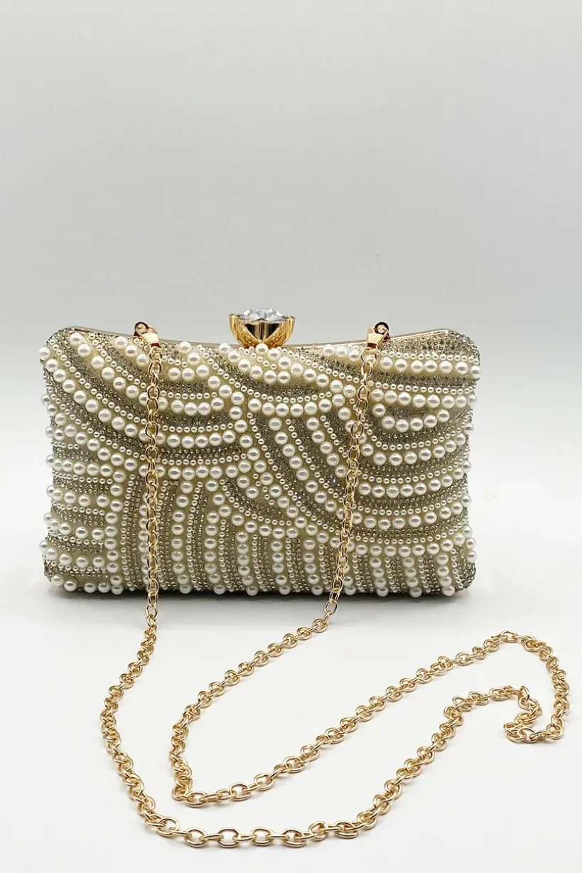 Luxurious Gold Pearl Embellished Clutch Bag by SVNX