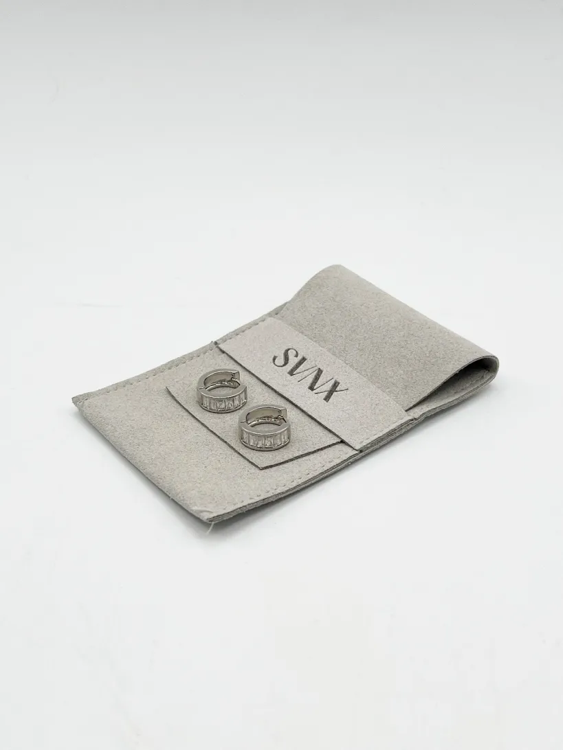 Mini Huggie Hoop With Clear Stones - Silver by SVNX