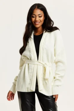 Open Front Cream Cardigan With Fringe Details by Liquorish