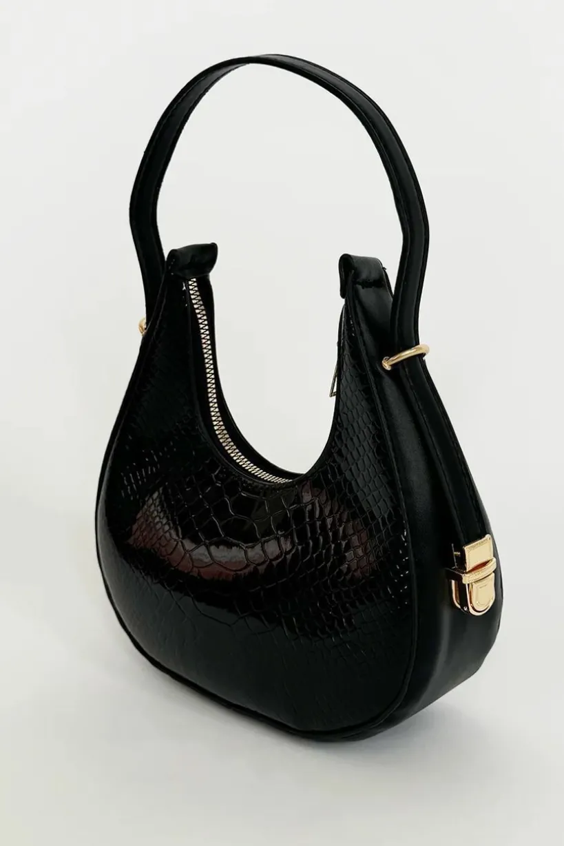 Round Shoulder Bag In Shiny Faux Croc by SVNX